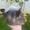 Elestial smoky quartz skull with green muscovite